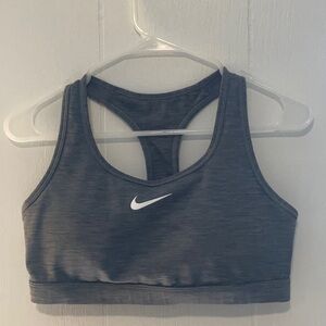 Woman’s Nike dark gray med sports bra